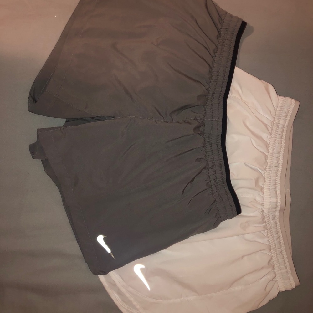 grey and white nike shorts